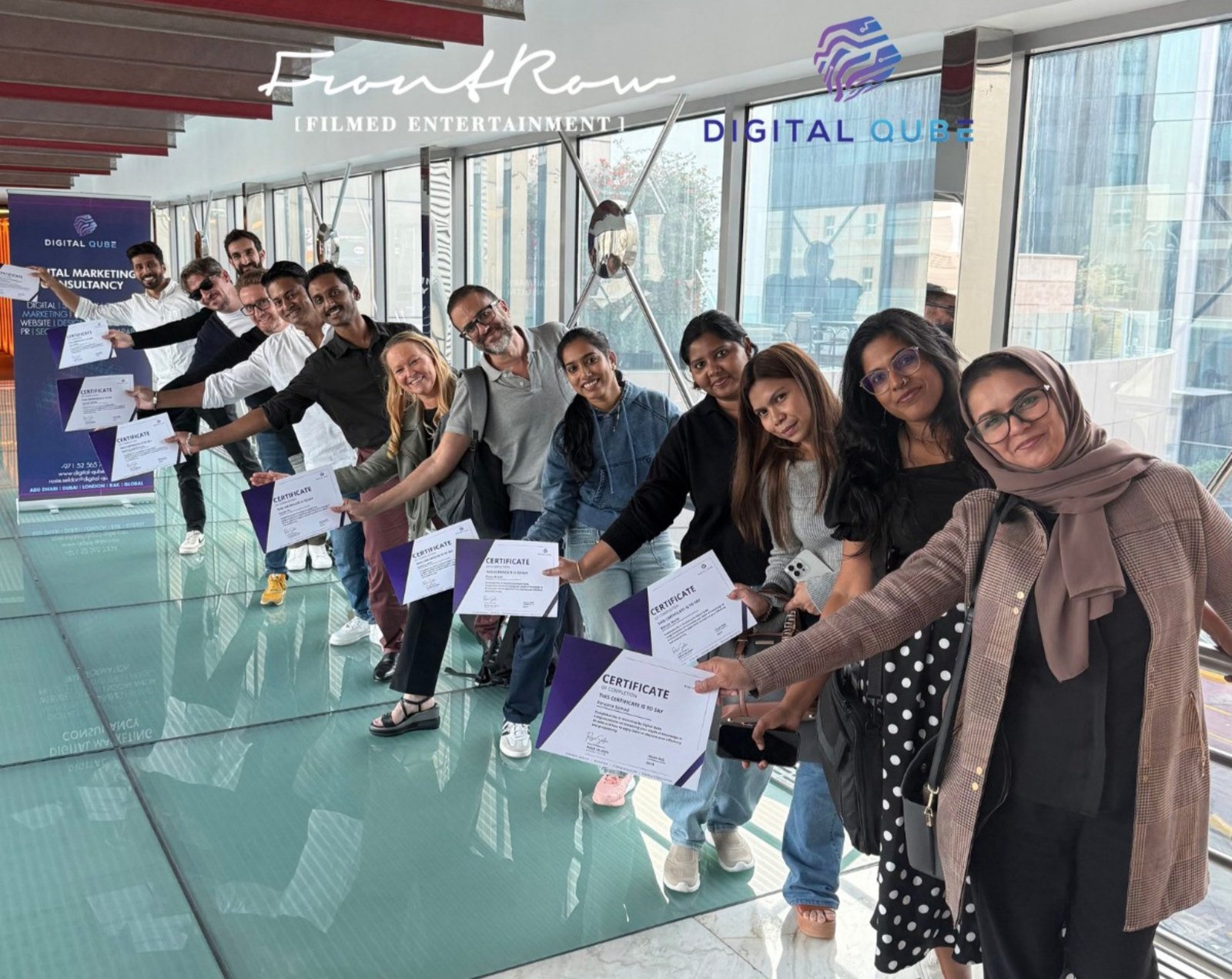 FrontRow team with their AI training certificates